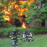<p>Firefighters on the scene of the house fire at Barrett Place on Tuesday night.</p>