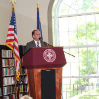 <p>Iona College President Joseph Nyre introducing Hochul to the crowd in New Rochelle.</p>