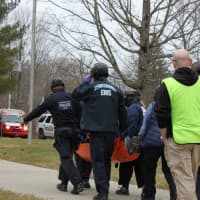 <p>Police departments from multiple towns, along with EMS, practice an active-shooter drill at the shuttered Lewisboro Elementary School.</p>