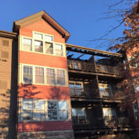 <p>A total of 54 units were deemed uninhabitable after a fire ripped through the StoneWood Condominium Complex at 100 Richards Ave. in Norwalk on Monday. All the residents of the complex have been displaced. Damage can be seen on the top floor.</p>