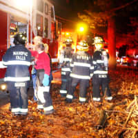 <p>Past Chief Ann Link covers the staging area assigning firefighters to crews and keeping the board that identifies where any firefighter is at any given moment.</p>