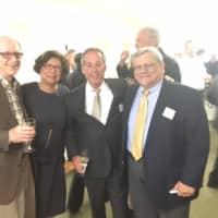 <p>Kaye Leong, second from left, the Business Development Officer of Darien Rowayton Bank, meets guests at Tuesday&#x27;s party.</p>