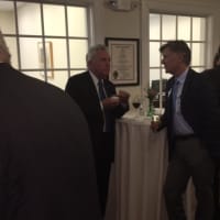 <p>Norwalk Mayor Harry Rilling talks with a guest at Tuesday&#x27;s party for Darien Rowayton Bank.</p>
