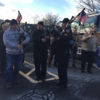<p>Pipes and Drums of Bergen County -- all Teaneck police officers -- play the Marine Corps Hymn as Kneer exits the parking lot.</p>