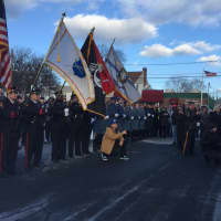 <p>Fellow Marine Corps veterans, the Hackensack and Teaneck Honor Guards, Pipes and Drums of Bergen County and crowds gather Friday in the cold to wish Kneer well.</p>