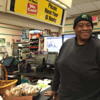 <p>Melvin of Teaneck is all smiles before purchasing a Powerball ticket.</p>
