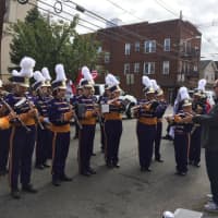 <p>The Garfield High School band practices prior to the start of the annual Pulaski Day Parade in Garfield Sunday morning, Oct. 4. </p>