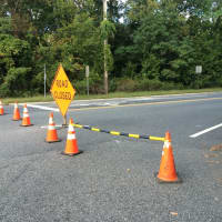 <p>Signs and cones block off part of Colonial Road in Franklin Lakes for construction Monday afternoon, Oct. 5.</p>