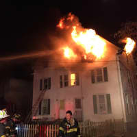 <p>Norwalk firefighters responded to a fire at a three-story multifamily home on Cove Avenue Monday night.</p>