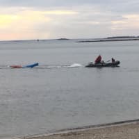 <p>The two kayakers are returned to shore in at Compo Beach in Westport.</p>