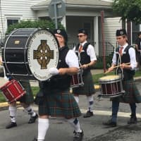 <p>Columbia and District Pipe Band from Hudson marches in the Rhinebeck Memorial Day Parade.</p>