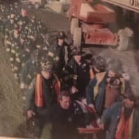 <p>Members of the Fire Department of New York (FDNY) and other rescue workers carried human remains from the toxic dust-laden Ground Zero site following the Sept. 11, 2001, terrorist attacks and continued to sift the site for more than six months.</p>