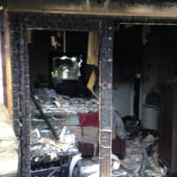 <p>The Red Cross is assisting two occupants after two of the four apartments in the multi-family home were damaged by the fire.</p>