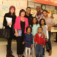 <p>Ginger Katz is shown with local families at the Courage to Speak Family Night.</p>