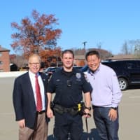 <p>Danbury Mayor Mark Boughton, Danbury police officer Greg Topa and K-9 Zeke, and State Sen. Tony Hwang outside Danbury Police Department, where ceremonies awarding donations from the Gleszer bequest were held. The donations will support K-9 programs.</p>