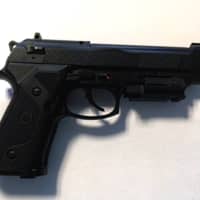<p>The replica handgun.</p>