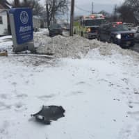 <p>The car barreled off the Ridgewood Avenue and down this patch of snow behind the Fashion Center, as the trio of first responders followed behind.</p>
