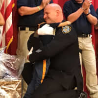 <p>Alex Hammer, 4, hugs NYPD Detective Damian Majersky.</p>