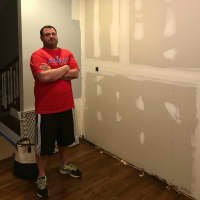 <p>Oradell&#x27;s Dave Dankin waits for the Siricos to finish work on his kitchen.</p>