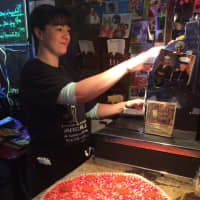 <p>Server Stephanie Corona works the cash register at the front of Barcelona&#x27;s Restaurant in Garfield Saturday, Oct. 17.</p>