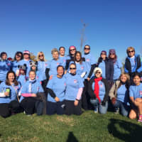 <p>The 2015 Ladies in Blue Fighting in Pink team come together before the start of the Making Strides Against Breast Cancer walk in Overpeck Park on Sunday, Oct. 18. </p>