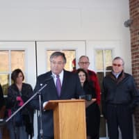 <p>Phil Lauria, chairman of the Wilton Commons GP Board of Directors, welcomes guests to the ribbon cutting ceremony for Wilton Commons Congregate.</p>