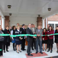 <p>George Ciaccio cuts the ribbon to officially open Wilton Commons Congregate. Nick Lundgren, deputy commissioner of the state&#x27;s Dept. of Housing, is left of Ciaccio, and Renee Dobos, CEO of MHA, is to the right.</p>