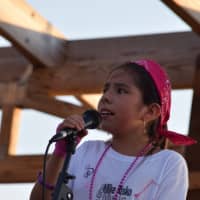 <p>A young performer shows off her vocal chops in Ossining.</p>