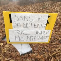 <p>The handwritten &quot;Danger&quot; sign that Victor Fernandes of Poughkeepsie walked past before his girlfriend&#x27;s dog, Neve, stepped into an animal trap on Thanksgiving. It was staked into the ground about five or six yards from where Neve was injured.</p>