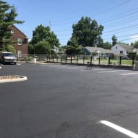 <p>Maywood&#x27;s Marketplace has added nearly a dozen new parking spots in a freshly-paved lot.</p>