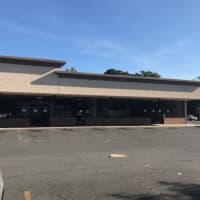 <p>Hillside Plaza, just down the road from Greenburgh Town Hall, as it looked along Tarrytown Road (Route 119) on Tuesday, Sept. 4. Longtime businesses have closed there to make way for a Tesla electric car dealership.</p>