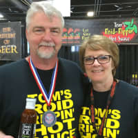 <p>Tom and Diane Slosser love all things hot sauce at their Monroe shop The Angry Pepper.</p>