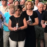 <p>About 200 people attended the vigil.</p>