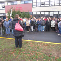 <p>Adi Vaxman addresses crowd at a rally to support Fair Lawn High School administrators.</p>