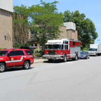 <p>Mahopac Falls Fire, along with mutual aid ambulance from Mahopac Fire Dept. line up along the curb in front of the High School.</p>