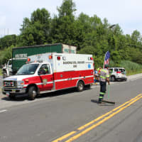 <p>Mahopac ambulance crew loads patient for transport to the hospital.</p>