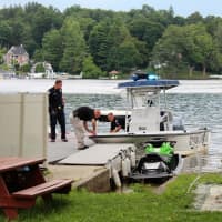 <p>Carmel Police Boat at the scene with Carmel Police Chief Michael Cazzarri on Monday, July 22.</p>