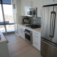 <p>The kitchen in a two-bedroom apartment at &quot;The Modern.&quot;</p>