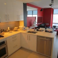 <p>The kitchen in a three-bedroom apartment at &quot;The Modern.&quot;</p>