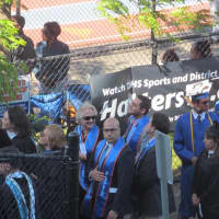 <p>The graduation speakers head to the ceremony with the members of the Board of Education, Mayor Mark Boughton and Principal Gary Bocaccio.</p>