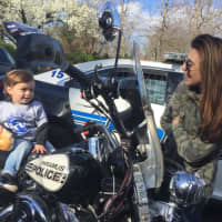 <p>Mason, almost 2, with mom getting a feel for the motorcycle.</p>