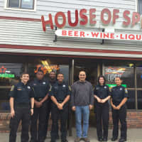 <p>Stratford Police Explorers with Albert Permonzono (center), owner of The House of Spirits. From left: Ken Shafer, Sean Excellent, advisor James Jackson, Devin Toth, Danielle Gordon and Anginette Repollet</p>