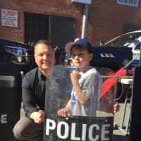 <p>Detective Sgt. Michael Cebulski with his son, Mikey, 7.</p>