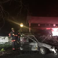 <p>Two people suffered burns in a car crash and explosion on Long Ridge Road in Danbury overnight Saturday.</p>