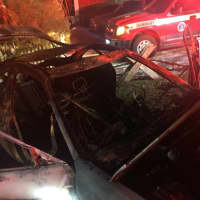 <p>A car was destroyed in a crash and explosion on Long Ridge Road in Danbury overnight Saturday.</p>