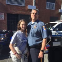 <p>This year&#x27;s Take Your Kids To Work Day at the Paramus Police Department was organized in part by Detective Doug Ohlendorf, pictured here with his daughter, Abigail, 14.</p>
