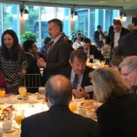 <p>Westchester County Executive George Latimer, seated, chats with business leaders before a speech last Wednesday, explaining why the county needs to raise property taxes by 2 percent to balance next year&#x27;s budget.</p>