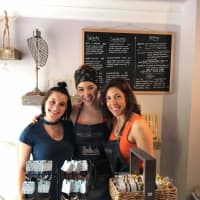 <p>Cindy Hartog, far right, of NewBrook Kitchen + Artisan Market in Westport, with her daughters Store Manager Deanna, far left, and Chef Danielle, middle.</p>