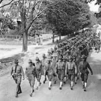 <p>Soldiers from Camp Merritt march along Madison Avenue.</p>
