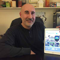 <p>Daniele Dario of Teaneck uses tools like an infrared camera, shown here, to complete a full energy audit on a home.</p>